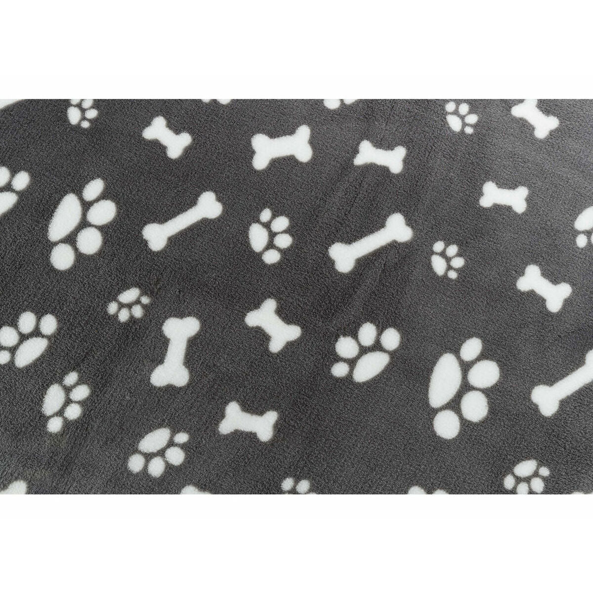 Detail des weißen Pfoten- und Knochenmusters auf grauem Plüsch